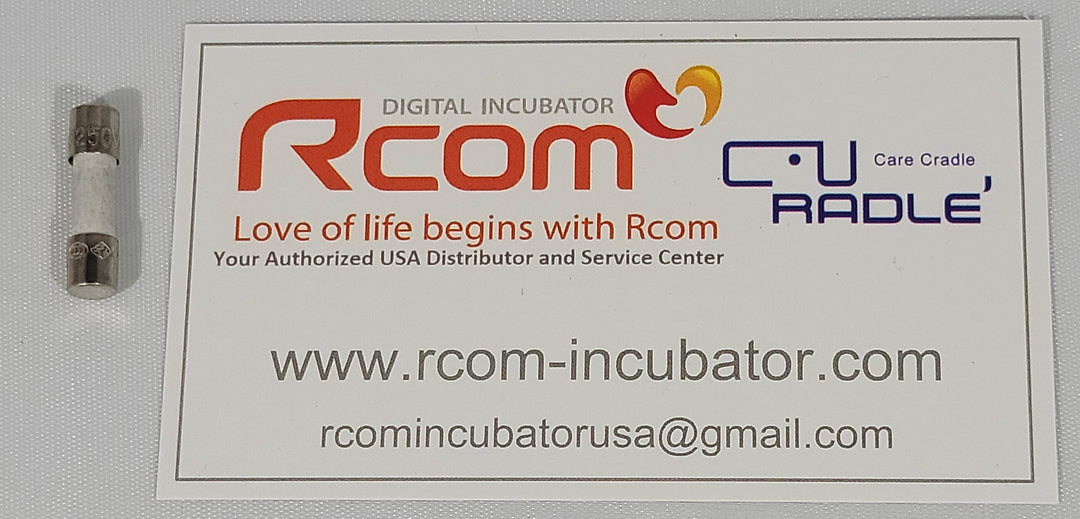 A replacement fuse for secondary PCBs, packaged in a clear plastic casing with a label that includes the branding and contact information for Rcom Incubators.