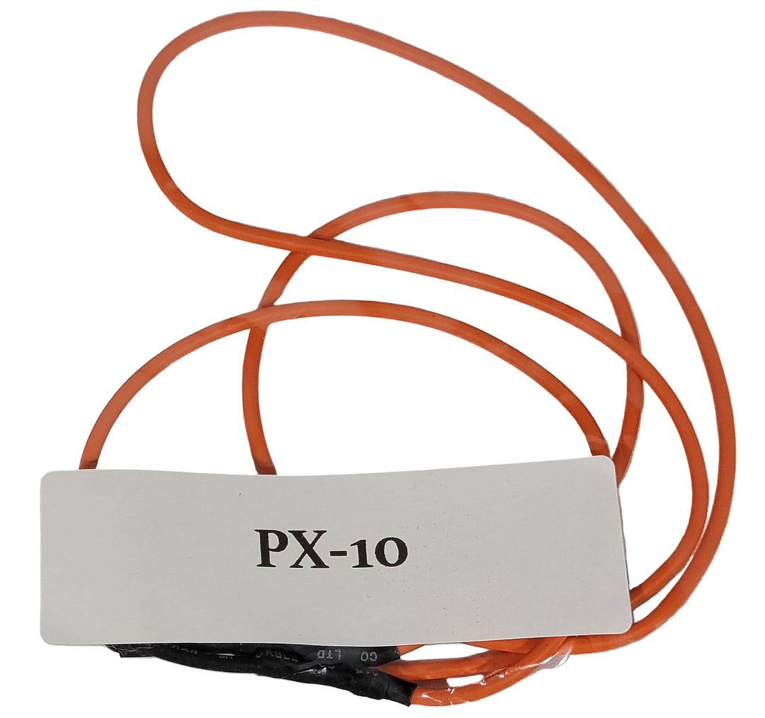 An orange silicone heating cable with a white label attached to it, indicating 'PX-10'.