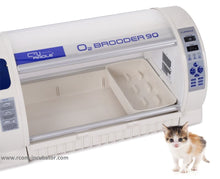 Load image into Gallery viewer, A picture of the white and blue oxygen brooder 90 showing a tray accessory that can be used for separating animals, a litter box, or as a birthing area.